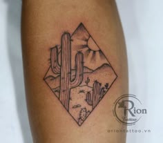 a cactus and diamond tattoo on the leg