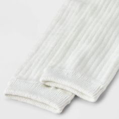 Keep cozy and stylish with the Women's Ribbed Supersoft Leg Warmer Boot Socks - Universal Thread™ 4-10. These socks offer a snug fit with a ribbed design that adds texture and warmth. The supersoft material feels great against your skin, making them ideal for chilly days. Wear them with boots or around the house for extra comfort and a touch of effortless style. Universal Thread™: Found exclusively at Target. Leg Warmer, Womens Mary Janes, Warm Boots, Boot Socks, Fabric Names, Universal Thread, Socks And Hosiery, Leg Warmers, Spandex Fabric