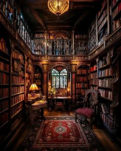 an old library with lots of books and furniture