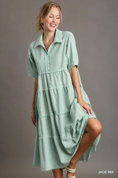 elevate your summer style with our balloon breeze maxi! crafted from a lightweight cotton-polyester blend, this dress features playful short balloon sleeves and chic fray details for added flair. the tiered a-line silhouette adds movement and flow, while the vibrant stripes bring a pop of color to your ensemble. perfect for picnics, beach days, or brunch outings, this dress is a must-have for your warm-weather wardrobe.fabric contents & fit notes:• model is 5'9" and is wearing a small.• all meas Green Summer Tiered Dress, Green Tiered Midi Dress For Beach, Green Tiered Midi Dress For The Beach, Green Breezy Flowy Midi Dress, Green Flowy Breezy Midi Dress, Breezy Flowy Green Midi Dress, Bohemian Tiered Short Sleeve Dress For Summer, Bohemian Tiered Dress With Short Sleeves For Summer, Spring Bohemian Striped Midi Dress