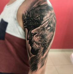 a man with a lion tattoo on his arm