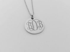 "Silver Monogram Circle Disc Necklace,Monogram Initials necklace,Silver Disk Necklace,Custom Disc Jewelry,Monogram Tag Necklace,Gold Initials Necklace This stunning silver monogram disc necklace is the unique fashion accessory you've been searching for. The design is simple, elegant and absolutely beautiful. This necklace makes a great everyday jewelry piece because it matches so well with any outfit. Wear it to dress up your favorite jeans outfit or wear it out to dinner on date night. This nec Gold Disk Necklace, Initials Necklace, Disk Necklace, Initial Necklace Silver, Gold Disc Necklace, Silver Monogram, Initial Necklace Gold, Monogram Jewelry, Gold Monogram