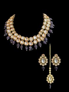 necklace set with earrings and tika made using uncut high quality kundan with amethyst beads 22carat gold plated meenakari work on the back Purple Kundan Bollywood Jewelry, Festive Purple Kundan Jewelry, Purple Kundan Necklace For Gifting, Purple Kundan Necklace Gift, Festive Purple Kundan Necklace, Necklace Set With Earrings, Amethyst Beads, Bridal Necklace, Necklace Set