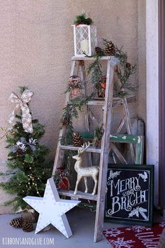 a christmas tree with decorations on it and a sign that says, diy rustic glam pine cones