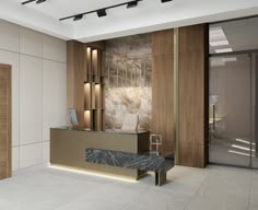 an office lobby with marble and wood accents