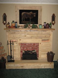 a living room with a fire place and an animal on the mantle