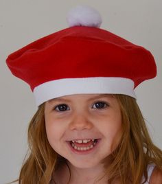 Christmas Hat Red and White Festive French Beret with Pompom Celebrate the Holidays or anytime. For both boys and girls. Babies, Toddlers, Children This hat is made from a soft fleece. The band is stretchy for a comfortable fit. This hat is available in the following sizes: X Small-Newborn-3mo.(15 inches circumference) Small-4-24 mo. (16 1/2 in.) Medium-2T-3T (18 - 19 in.) and Large- 4-9 Years (20 - 21 in.) It is easier to fit the hat to the child if you measure the child's head where the hat is Kids Fleece Hats, Christmas Beanie, Fleece Patterns, French Beret, Kids Beanies, Fleece Hat, Kids Fleece, Outer Wear, Baby Hat