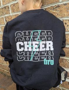 Kids Cheer Bro sweatshirt. Large logo on back of shirt. Can add small logo onto front. These are for kids sizing. Black School Spirit Sweatshirt With Crew Neck, Black Fleece Tops For Team Spirit, Fleece Crew Neck Tops For School, School Spirit Long Sleeve Sweatshirt With Logo, School Fleece Crew Neck Sweatshirt, School Fleece Tops With Letter Print, Team Spirit Fleece Tops With Graphic Print, School Spirit Crew Tops For Streetwear, Black Sporty Sweatshirt For School