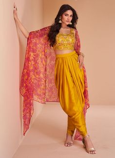 Yellow satin readymade dhoti set cape suit 5352 Crop top with Dhoti set and shrug style cape suit 3 pcs set. Crop top and Dhoti in satin with original mirror work embroidery, resham work and cape suit in organza fabric with digital print work. Desc:  Style : Dhoti Style crop top cape suit  Color :Yellow  Fabric : Satin,Organza Wash Care : Dry clean Sleeve Style : cape ,Work: embroidery and digital print Long Sleeves : Done only in Custom Stitch Sleeves Lining : Done only in Custom Stitch Bust Size : Free size 40 to 42 Inches Occasion : Wedding   Festival   Christmas   Diwali   Sangeet   Reception   Ceremonial   Dussehra. With Express Free Shipping and Custom Stitching, Buy Indian Party wedding and bridal Anarkalis Yellow satin readymade dhoti set cape suit 5352 online in USA, UK Suit With Shrug, Dhoti Style Dresses, Dhoti Salwar Suits, Diwali Dresses, Patiala Salwar Suits, Banarasi Lehenga, Haldi Outfit, Diwali Outfits, Salwar Dress