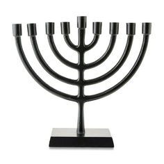 a black menorah on a white background