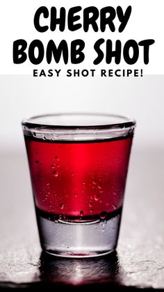 a shot glass filled with red liquid and the words cherry bomb shot easy shot recipe