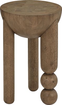 a wooden stool with three small rocks on the bottom