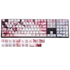 a computer keyboard covered in pink and white keys with pictures on the bottom half of it