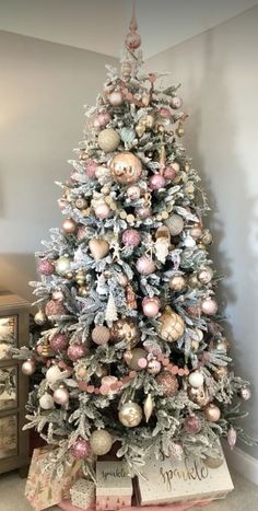 a decorated christmas tree in a living room