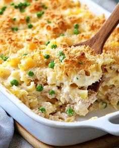 a casserole dish with chicken and peas