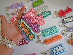 Decorate your bag or child's backpack with these fun personalized name tag keychains!  Choose your own color and font from the charts in the listing photos and make it your own!  These make great back to school items, gifts for teachers, party favors, or a "just because" gift! Glitter Stars style can be found here: https://www.etsy.com/listing/1680950008 Confetti Glitter Styles can be found here: https://www.etsy.com/listing/1499618022 Bulk orders for sports/dance/cheerleading teams and party fa Personalized Green Craft Supplies For Gift, Customizable Cute Craft Supplies For Personalized Gifts, Fun Multicolor Keychains For School, Personalized Birthday Craft Supplies, Fun Personalized Craft Supplies For Birthday, Customizable Craft Supplies For End Of School Year Gifts, Fun Customizable Craft Supplies For Gifts, Personalized Pink Keychains For Personal Use, Personalized Playful Keychains For Gifts