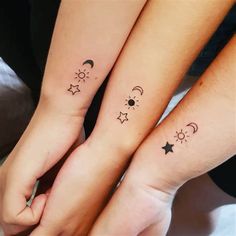 two people with matching tattoos on their arms