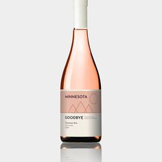 a bottle of minnesota rose wine on a reflective surface with the word goodbye printed on it