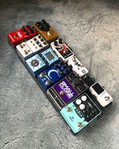 an assortment of different pedals arranged on top of each other