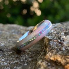 Stunning 6mm wide DiamondCast™ Unicorn poop with opal inlay. This wedding band is custom-made for you right here in the USA by skilled artisans who have an uncompromising passion for quality and style. The finish on this ring is polished with a rounded profile. *6mm DiamondCast™ Unicorn Poop with opal inlay *Available in sizes 4-15.5 in whole, half, and quarter size increments *Handcrafted by Skilled Artisans SKU: COB-6F-DC UP-11.5G-PURP OPAL About DiamondCast: DiamondCast™ Blanks are made with Cobalt Wedding, Unicorn Poop, Ring Opal, Custom Ring, Opal Ring, Lovely Jewellery, Opal Rings, Custom Rings, Cobalt