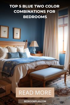 a bed room with a neatly made bed and blue walls