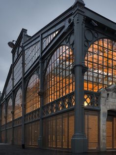 an old building with lots of glass on it