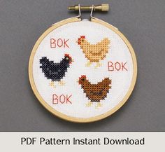 a cross stitch pattern with chickens on it