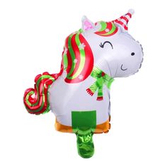 an inflatable unicorn balloon with a green ribbon around it's neck and head