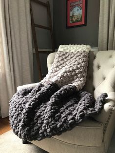 a chair with a blanket on top of it