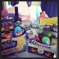 an assortment of beer and snacks on a table