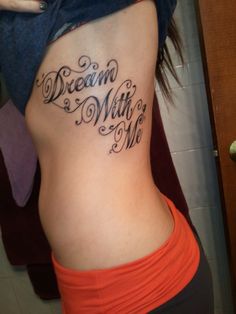 a woman's stomach with the words dream, white and me written on it