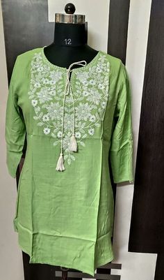 Kurti Rayon Slub dyed  print  With white embroidery, qureshia Chikan Laces & hand work  Size-38 to 44 Colors- 5 summer pestle color👌👌 Please check your Bust size before placing your order to have hassle free experience. For any clarification, please write back to us & we are already delighted to help you in finding right product for your fit.  100% Guarantee & customer Satisfaction. We accept PayPal as payment gateway, a safest way for both you & us. Feel free to write us in case any query for any issue with your Order or to understand the products. Thank you so much for visiting. Have a great day ahead! Cotton Pista Green Dress For Festivals, Pista Green Cotton Dress For Festivals, Embroidered Cotton Dress For Diwali, Pista Green Cotton Dress With Resham Embroidery, Diwali Embroidered Cotton Dress, Green Cotton Kurta With Embroidered Border, Summer Pista Green Kurta With Floral Embroidery, Green Cotton Dress With Intricate Embroidery, Embroidered Pista Green Summer Dress