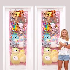 a woman standing in front of two doors with stuffed animals on them