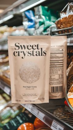 a bag of sweet crystals sitting on top of a shelf in a grocery store