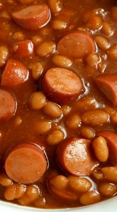 a bowl filled with beans and sausages