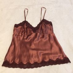 This Gorgeous Charmeuse Camisole In The Prettiest Rose Color Silk With A Burgundy Lace Trim. It Is By Abercrombie And Fitch, Is A Size M, And Features Adjustable Lingerie Straps. It Can Be Worn Just Peeking Out From Under A Blouse Or In Lieu Of One If You’re Feeling Yourself. Elegant Brown Camisole, Vintage Lace Top Sleeveless Camisole, Vintage Cami Top For Daywear, Vintage Sleeveless Camisole With Lace Top, Feminine Sleeveless Satin Top, Fitted Satin Lace Top, Vintage Tops With Lace Trim And Spaghetti Straps, Vintage Lace Trim Top With Spaghetti Straps, Vintage Spaghetti Strap Tops With Lace Trim