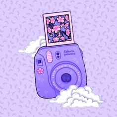 a purple camera with pink flowers on top and clouds around it, in the sky