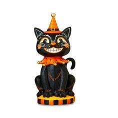 a black cat figurine wearing a witches hat