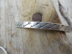 Arrow bangle bracelet...5mm wide, handmade in sterling silver 925....the bracelet is 2 3/8" in diameter, which is between a small and medium bracelet......great looking with an American Indian look.S - 2 1/4 inches (57mm)M - 2 1/2 inches (64mm)L - 2 3/4 inches (70 mm) Sterling Silver Etched Bangle Bracelet, Etched Sterling Silver Bangle, Etched Sterling Silver Bangle Bracelet, Stamped Sterling Silver Bangle Cuff Bracelet, Stamped Sterling Silver Bangle Bracelet, Stamped Sterling Silver Bangle, Sterling Silver Etched Bangle, Unique Stamped Sterling Silver Bangle, Indian Look