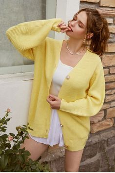 Add the finishing touch to your everyday wear with our Fleur Button Front Yellow Cardigan. Features a vertical striped texture this cozy knitwear coming with a cute pearl front buttons. #effortlesslook #fashion #fashiondaily #casualootd #casualstyle #streetstyle #streetchic #cozysweater #yellow #yellowcardigan #pearlbuttons #knitwear #buttonscardigan #warmcardigan #comfortandstyle #dailyootd #outfit #dailyoutfitinspo #wearingtoday #trendyoutfits #shopaholic #wardrobeessentials #outfitoftheday Plain Cardigan, Puff Sleeve Cardigan, Lantern Sleeve Sweater, Autumn Sleeve, Pull Oversize, Yellow Cardigan, Knitting Women Cardigan, Mode Casual, Cardigan Outfits