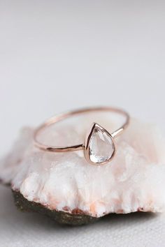 This pear-shaped white topaz ring: | 43 Stunning Rose Gold Engagement Rings That Will Leave You Speechless Body Chains, Gold Glam, Rose Gold Engagement, Rose Gold Engagement Ring, Topaz Ring, Stacking Ring, Gold Engagement Rings, Pretty Jewellery, Pear Cut