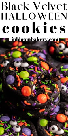 black velvet halloween cookies with sprinkles and candy eyes on the top one