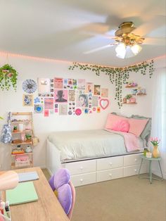 a child's room with a bed, desk and chair