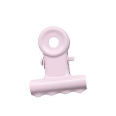 a pink plastic object on a white background