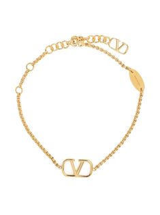 Gold-tone metal VLOGO plaque bracelet from VALENTINO GARAVANI featuring bead chain, spring-ring fastening and maxi VLOGO Signature. Adjustable Logo Charm Bracelet, Gold-tone Metal Jewelry With Logo Plaque, Metal Bracelet With Logo Charm, Yellow Gold Metal Jewelry With Gold-tone Logo, Gold-tone Chain Bracelet With Logo Charm As Gift, Gold-tone Bracelet With Logo Charm As Gift, Gold-tone Chain Metal Bracelet, Elegant Metal Chain Bracelet With Logo Charm, Gold-tone Plated Jewelry With Logo Plaque