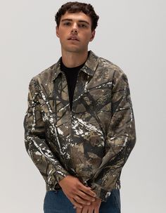 Rsq Canvas Workwear Jacket. Canvas Work Jacket With Allover Camo Pattern. Zip-Up Front Closure. Front Pockets. Traditional Collar Neck. Cuffed Long Sleeves And Hem. 100% Cotton. Machine Wash. Imported. Camouflage Long Sleeve Windbreaker For Fall, Long Sleeve Camouflage Windbreaker For Fall, Fall Camouflage Cotton Outerwear, Camouflage Long Sleeve Workwear Outerwear, Camouflage Outerwear For Workwear In Fall, Camouflage Long Sleeve Outerwear For Work, Fall Camouflage Outerwear For Work, Camouflage Long Sleeve Cotton Outerwear, Camouflage Cotton Long Sleeve Outerwear