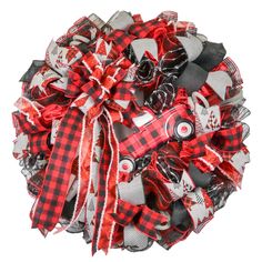 a red and black wreath with the words ready to ship