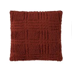 a red pillow with squares on it