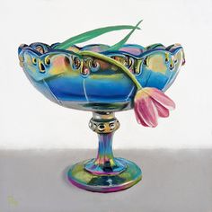 a painting of a blue glass bowl with pink flowers in the bottom and green stems sticking out of it