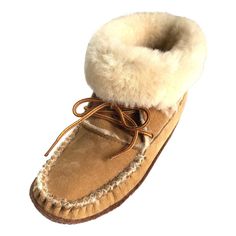 Description Details Sizing No other slipper will keep you more warm and comfy in the winter than these women's slipper boots. These authentic Native American crafted moccasin slippers are made from the best and most luxurious, real genuine sheepskin wool. The entire slipper boot is handmade from the softest and furriest shearling sheepskin. The exterior of these women's house slippers is suede which is the reversed side of the sheepskin in a brown color. For added durability they have an added r Native American Crafts, Sheepskin Slippers, Slippers For Women, Moccasins Slippers, Leather Moccasins, Natural Tan, Native American Indians, House Slippers, Slipper Boots